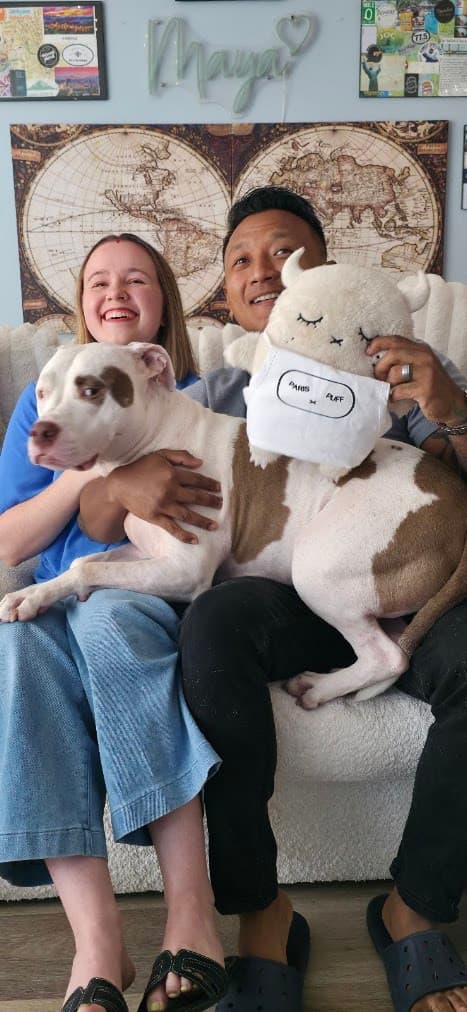 Paris, Yug, Puff, and their dog Skye, who thinks he's the real mascot
